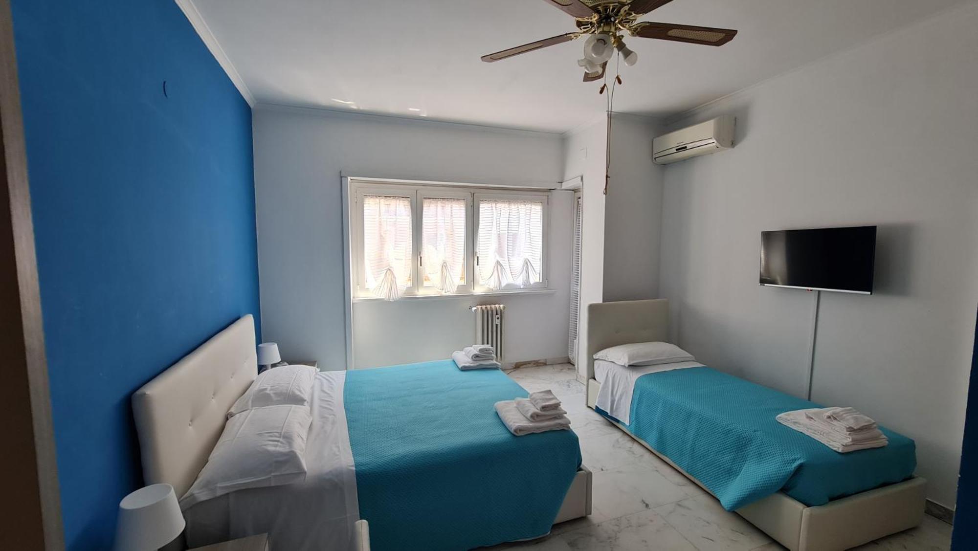 Chambre Triple avec Salle de Bains Privative