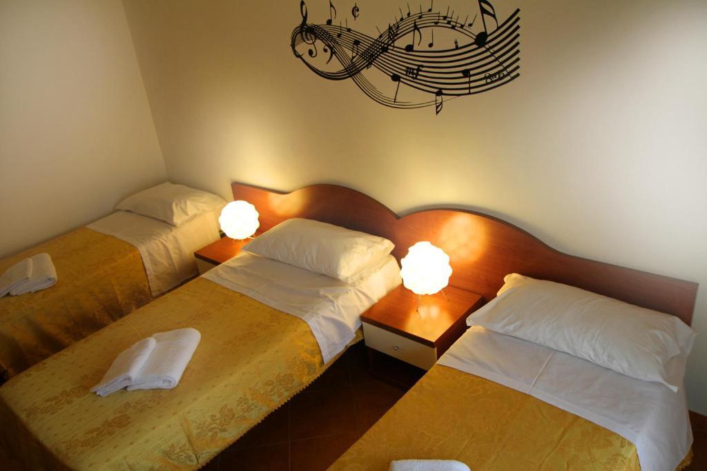 Chambre Triple avec Salle de Bains Commune